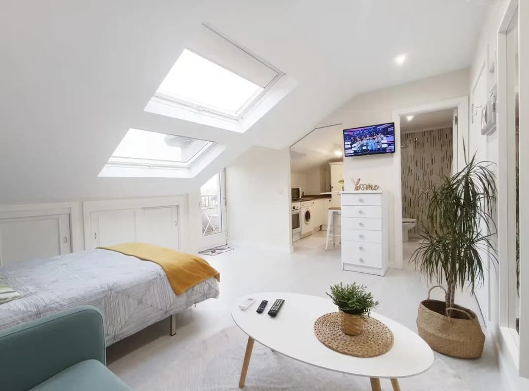 A cozy studio with a terrace